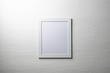 White empty frame with copy space on white wall