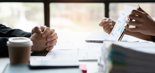 Accounting consultant, businesswoman meeting to discuss and clarify details on chart And data...
