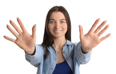 Young woman in shirt showing hands on white background, closeup