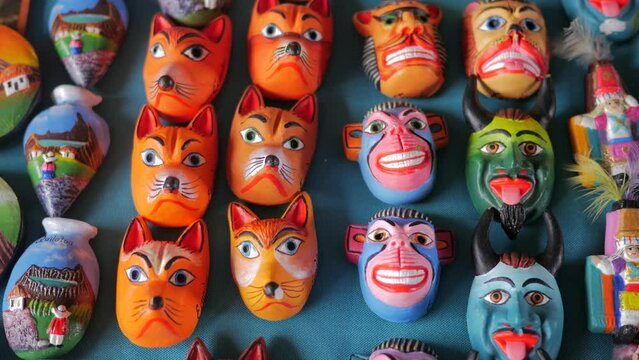 Static shot of Halloween devil masks that look funny. horror themed.