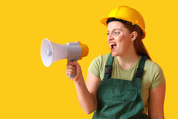 Female builder shouting into megaphone on yellow background