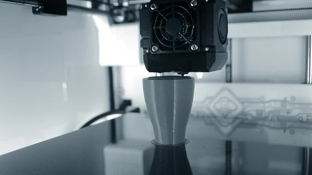 3D printer. Working 3d printer close-up. 3d printer printing object from molten plastic. Printing prototype. New modern printing technology on 3D printer. Additive progressive technologies. FDM