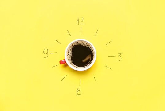 Creative composition with drawn clock and cup of coffee on yellow background © Pixel-Shot