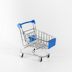 metal empty grocery shopping basket. isolated on a white background. space for copying.