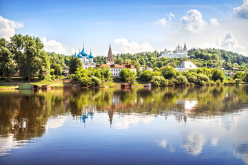 Fototapeta na wymiar Summer landscape on the Klyazma river and cathedrals on the hill, Gorokhovets