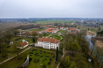 Fototapeta na wymiar Aerial beautiful spring day view of Pakruojis manor park, Lithuania