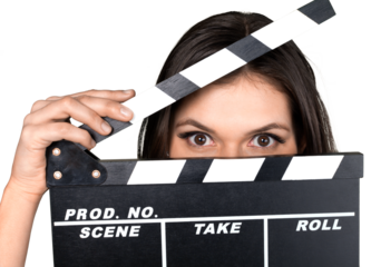 Woman Holding The Clapperboard in Front of Her Face - Isolated