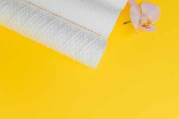 cartridges for water purification on a yellow background. Concept of clean water at home