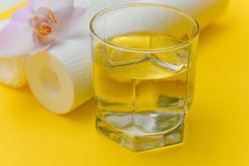 Cartridges for water treatment systems on yellow background.