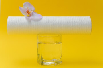 cartridges for water purification on a colored background. Concept of clean water at home