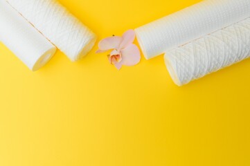 cartridges for water purification on a yellow background. Concept of clean water at home