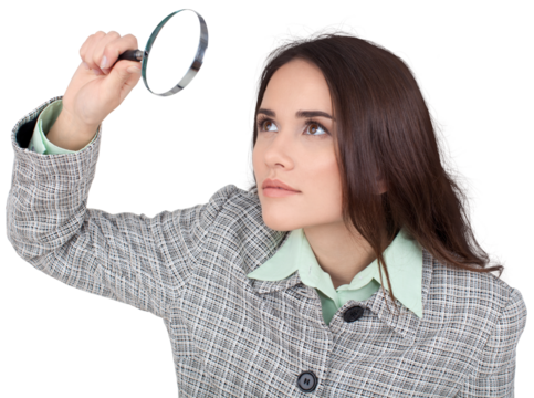 Portrait of young cute business woman holding magnifying glass isolated on white background