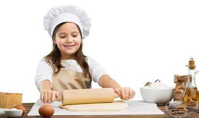 Happy child in chef costume stretch the dough