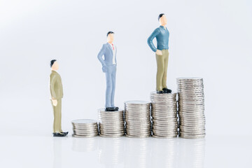 Investment merchant puppet model and coin of white background