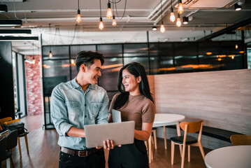 After class, college students discuss, share ideas and thoughts, and learn from each other. Modern and spacious areas in academic libraries that support a more tech-oriented and collaborative society