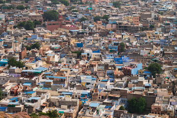Aerial view of blue city,Jodhpur,Rajasthan,India. Resident Brahmins worship Lord Shiva and painted...