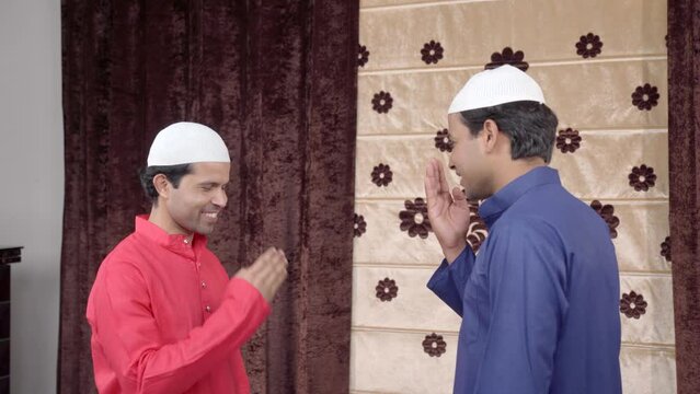 Muslim men greeting by doing Adaab