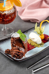Chocolate souffle with ice cream served in a fine dining restaurant