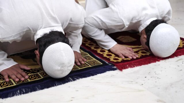 Indian muslim doing Sajda prayer at home