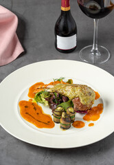 Lamb chops with various vegetables in a fine dining restaurant