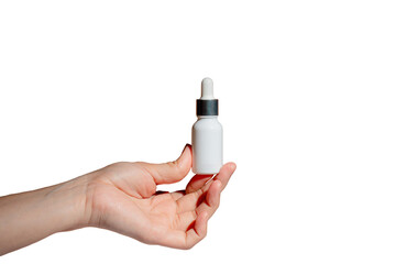 A white glass dropper bottle in hand on transparent background 