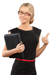 Beautiful young businesswoman with notepad giving thumbs up