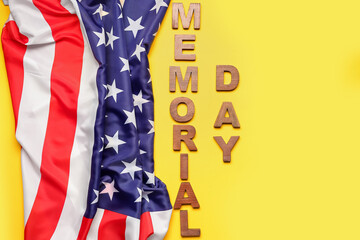 Text MEMORIAL DAY with USA flag on yellow background