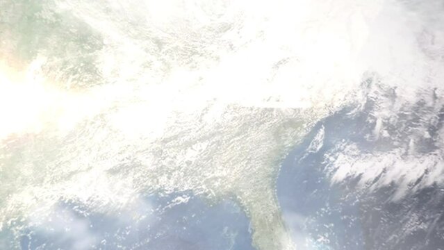 Earth zoom in from outer space to city. Zooming on East Point, Georgia, USA. The animation continues by zoom out through clouds and atmosphere into space. Images from NASA