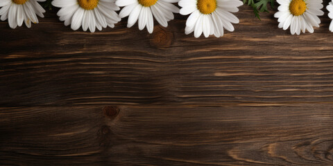 Chamomile flowers on wooden background. Top view with copy space. Generative AI