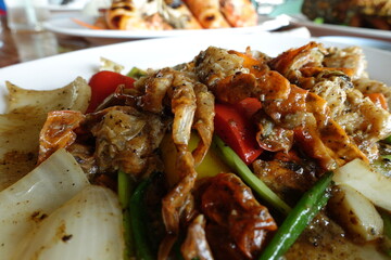 many stir-fried soft-shell crabs in a plate