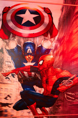 Naklejka premium Ternopil, Ukraine- March, 2023: Captain America with Spider Man poster in kids play room.
