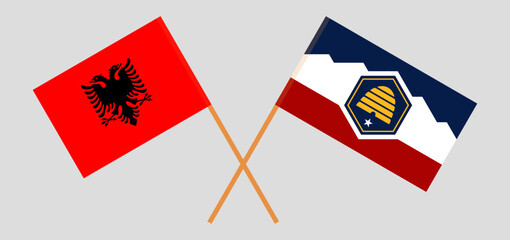 Crossed flags of Albania and The State of Utah. Official colors. Correct proportion