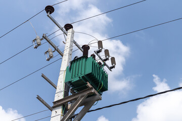 High voltage power line details mounted on a concrete pole