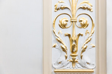 Classic luxury interior details, golden elements of gypsum decoration