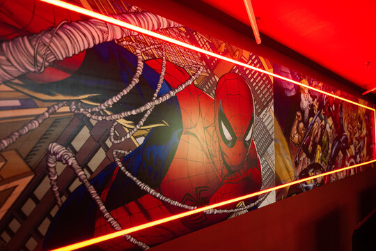 Ternopil, Ukraine- March, 2023: Marvel super heroes poster in red play room.