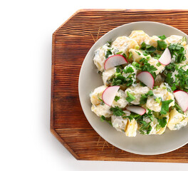 Plate of tasty Potato Salad with greens and radish on white background