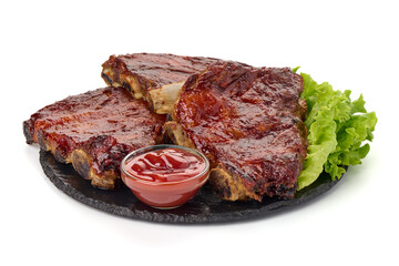 Delicious spicy marinated ribs in a bbq or tomato sauce with herbs, isolated on a white background.