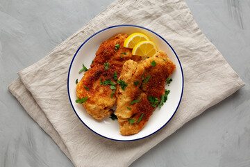 Homemade Chicken Cutlets on a Plate, top view. Flat lay, overhead, from above.