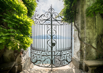 View of Lake Como from the botanical garden of Villa Monastero, Varenna, Italy - obrazy, fototapety, plakaty