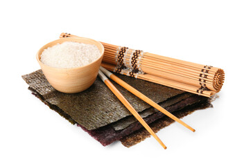 Natural nori sheets, chopsticks, bamboo mat and bowl of rice isolated on white background
