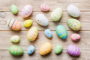 decorative easter eggs on colored background. easter eggs collection top view with copy space