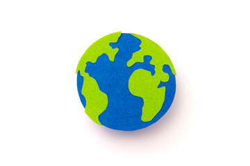 Earth made of paper cut isolated on white background. paper art minimal concept.