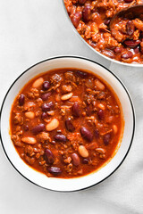 Stewed beans with ground beef, jalapeno pepper and bacon