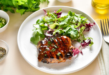 Roasted pork steak with salad from fresh vegetable
