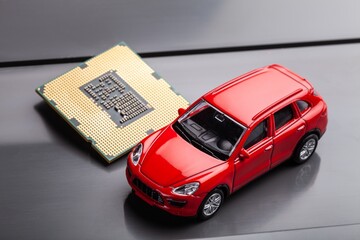 CPU chip with mini car. Computer chip in car industry