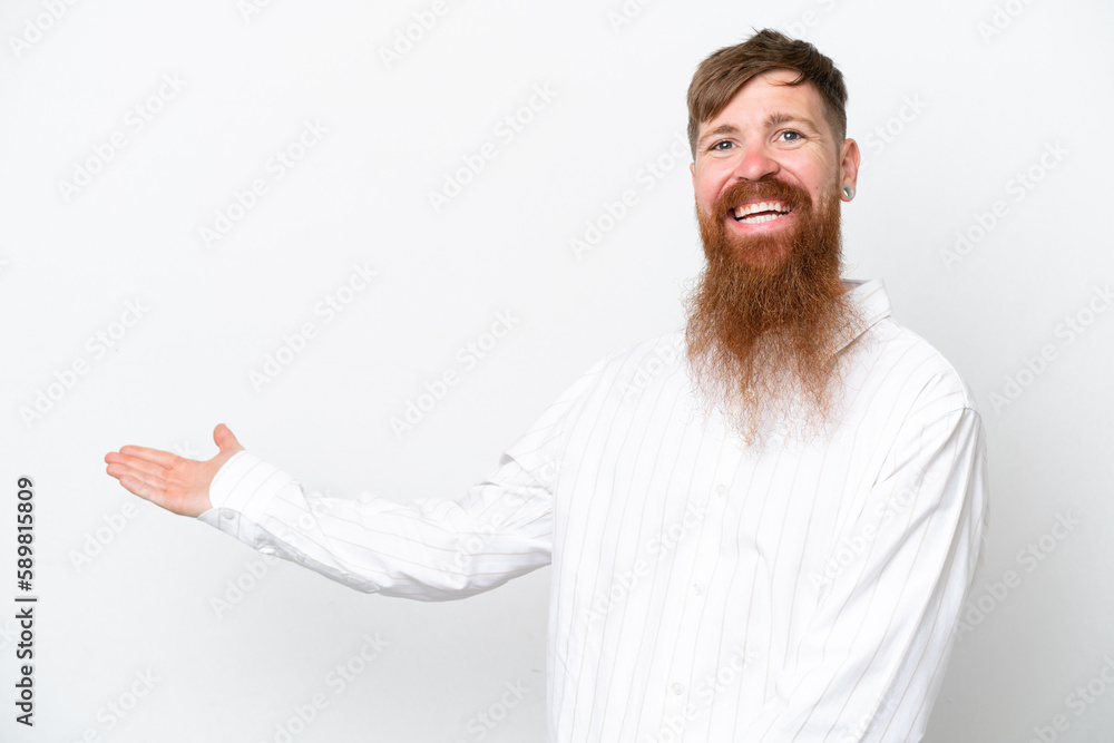 Wall mural Redhead man with long beard isolated on white background extending hands to the side for inviting to come