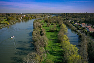 Fototapeta na wymiar aerial view on the Seine and the town of Boissise le Roi