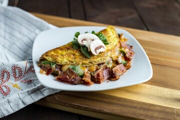 High angle closeup of a delicious Omelet with mushrooms