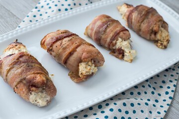 Plate with chicken wrapped with bacon