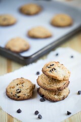 Closeup shot of gluten-free cookies with chocolate put on the table on the blurred background